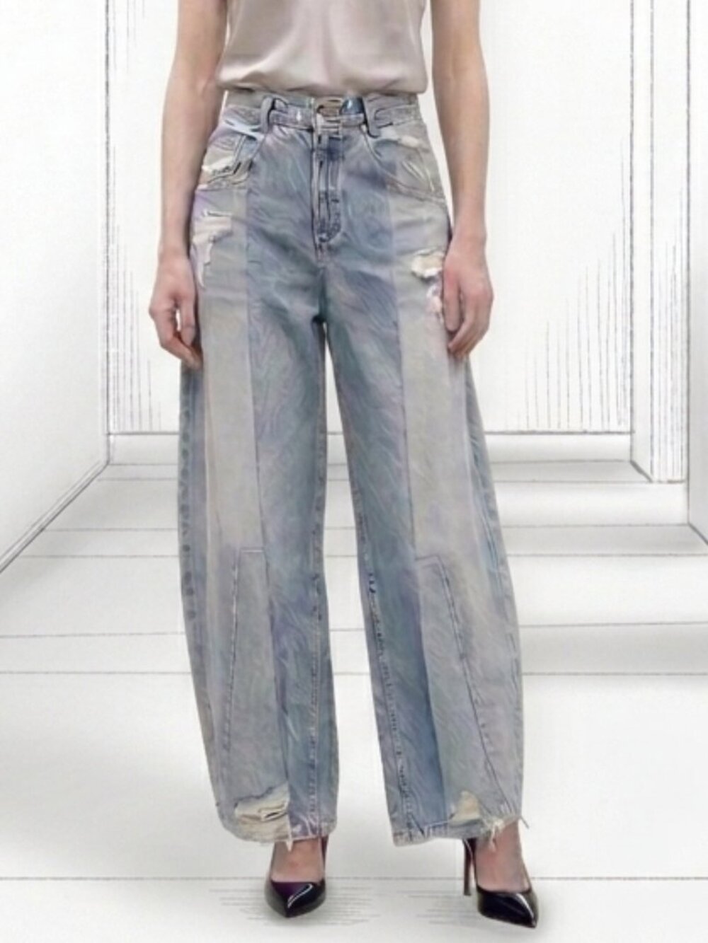 Upcycled horseshoe two tone jeans.